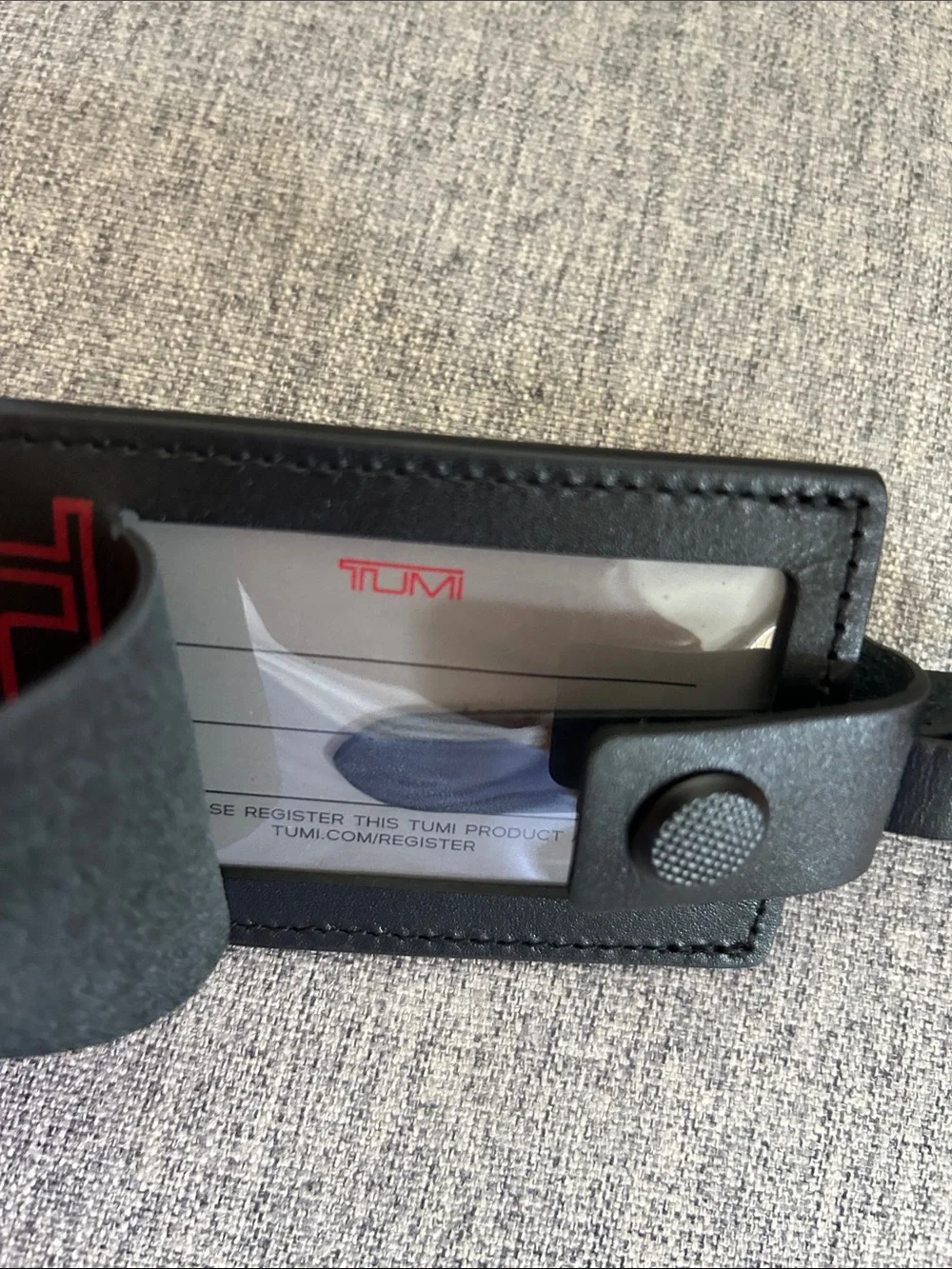 Tumi Black Leather Luggage Tag with Red Logo